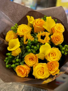 Yellow rose, sunflower, hypericum berries and calla lily sunset bouquet – Jerome Florists NYC