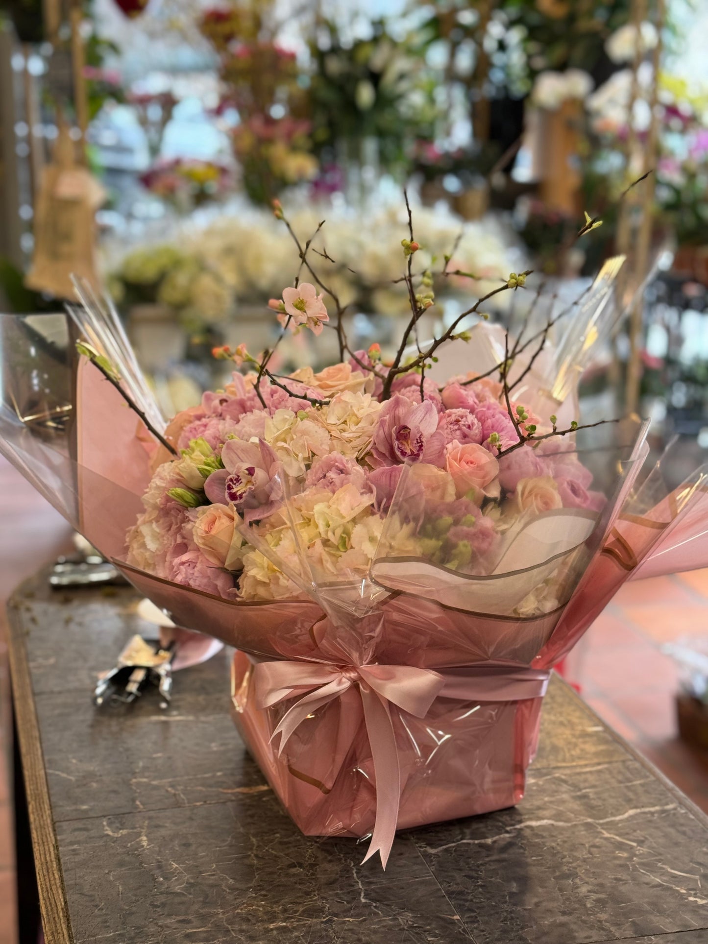 Bold pink hydrangea peony lily and orchid statement arrangement – Jerome Florists NYC