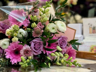 Pink purple rose, Gerber daisies, snaps and ranunculus cheerful bouquet – Jerome Florists NYC