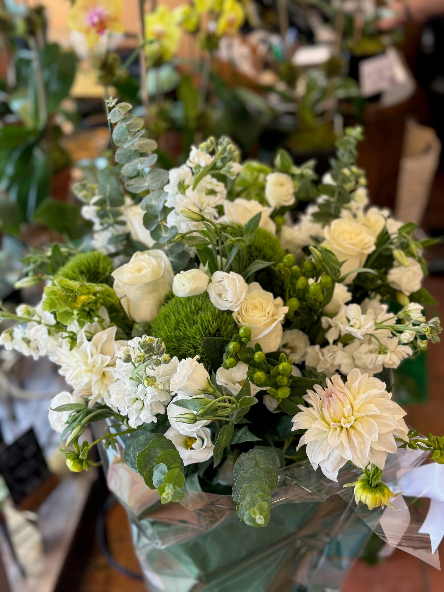 White rose, snaps, dahlias, lisianthus, dianthus, hypericum berries, eucalyptus and dahlia elegant bouquet – Jerome Florists NYC