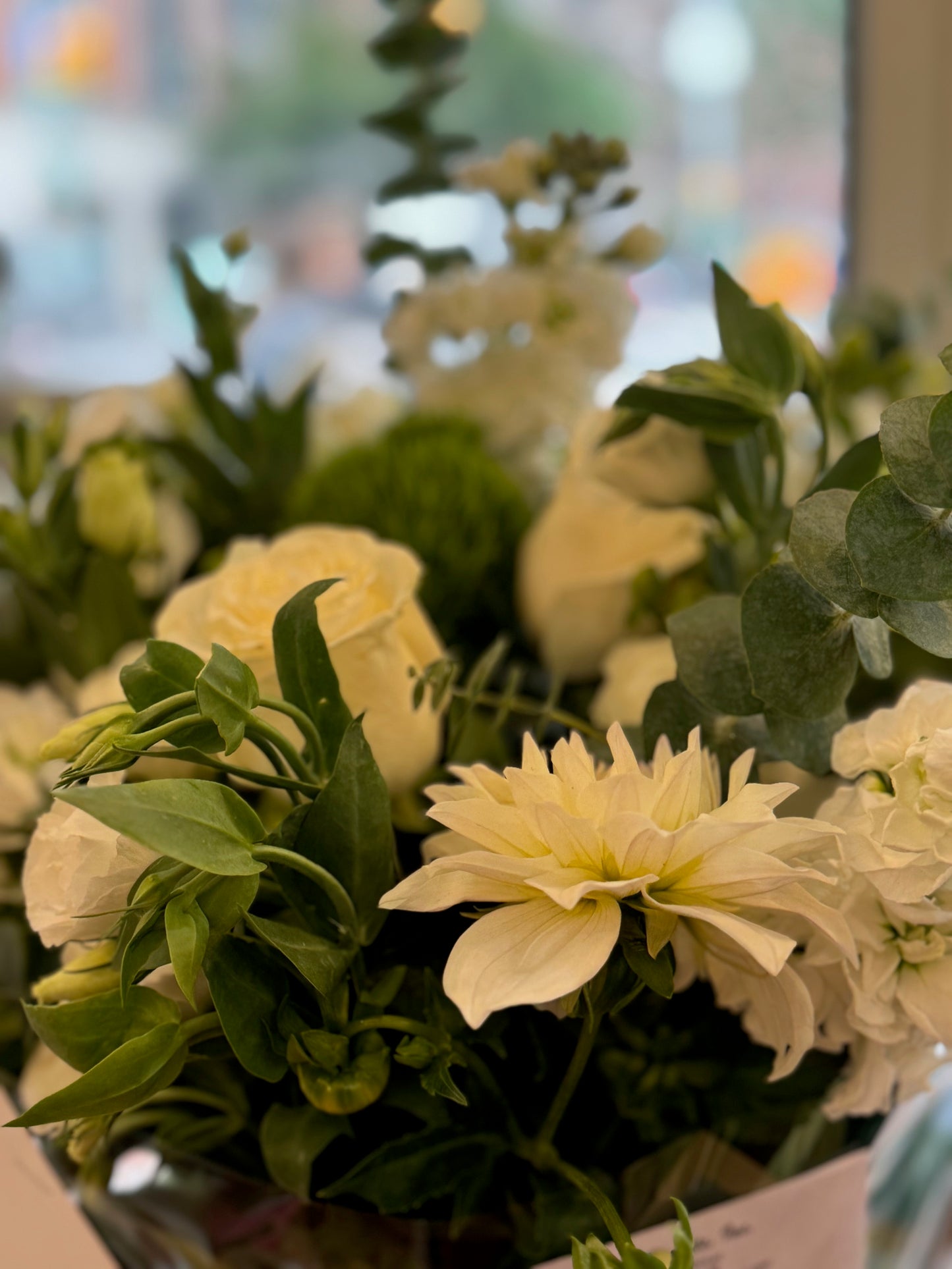 
                    
                      White rose, snaps, dahlias, lisianthus, dianthus, hypericum berries, eucalyptus and dahlia elegant bouquet – Jerome Florists NYC
                    
                  