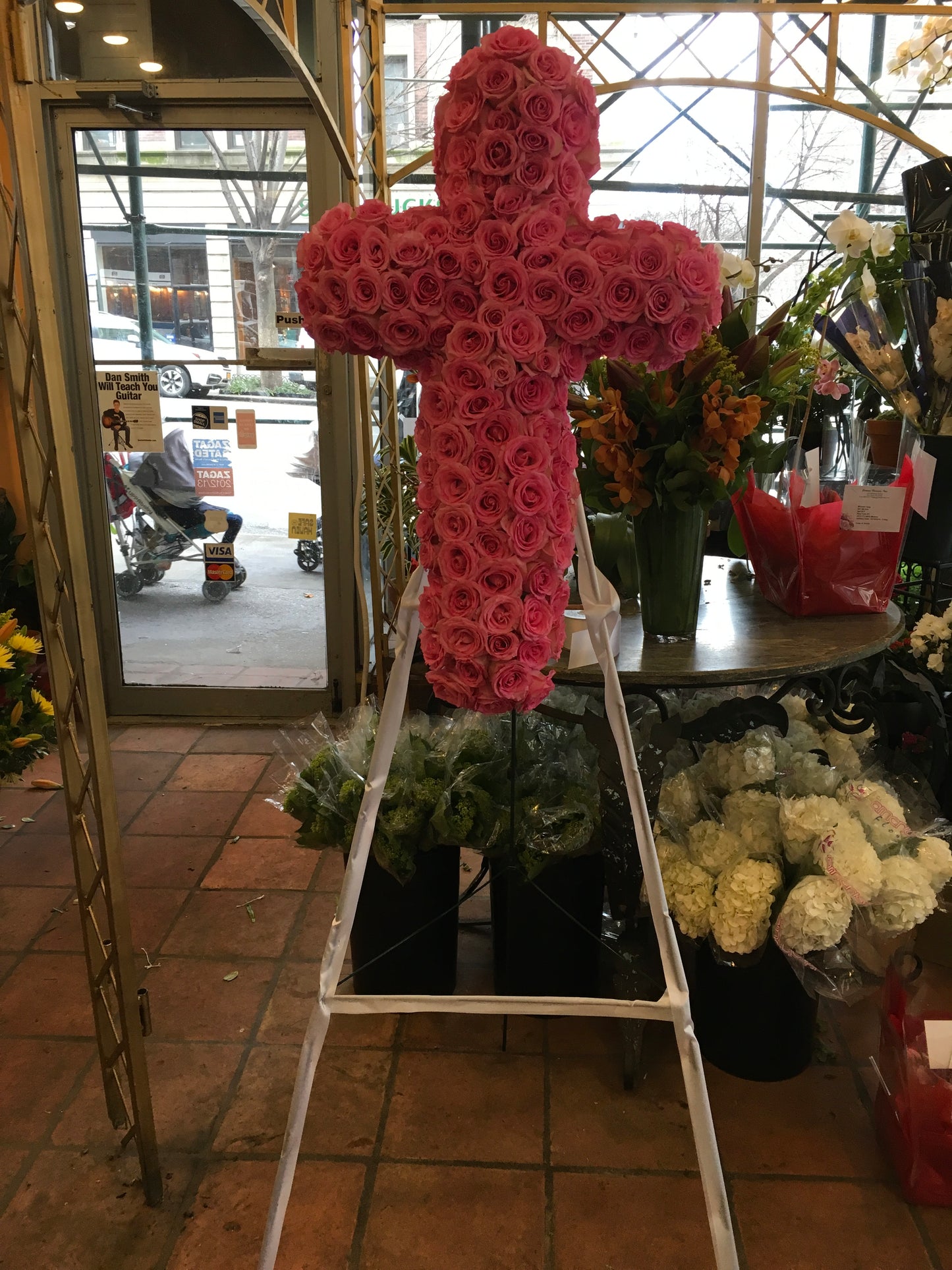 
                    
                      rose standing floral cross funeral arrangement – Jerome Florists NYC
                    
                  