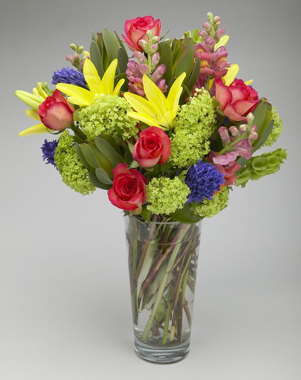 Pink roses and , yellow lilies, blue hyacinth 