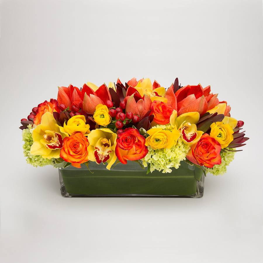 Autumn floral centerpiece with hydrangea, amaryllis, roses, cymbidium orchid heads, proteas and ranunculus – Jerome Florists NYC