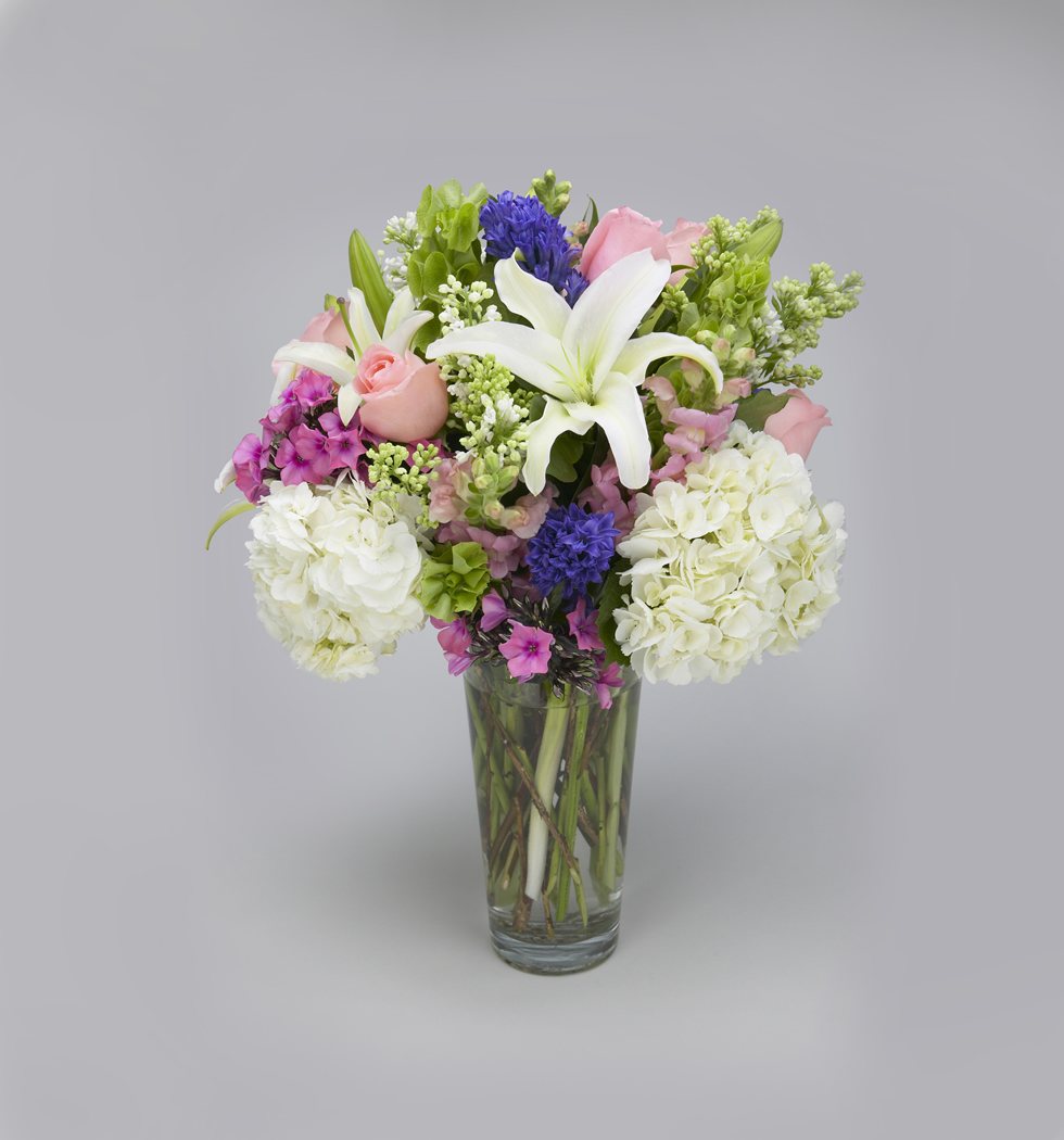 White hydrangea, pink roses, lilies, snaps and hyacinth pastel arrangement – Jerome Florists NYC