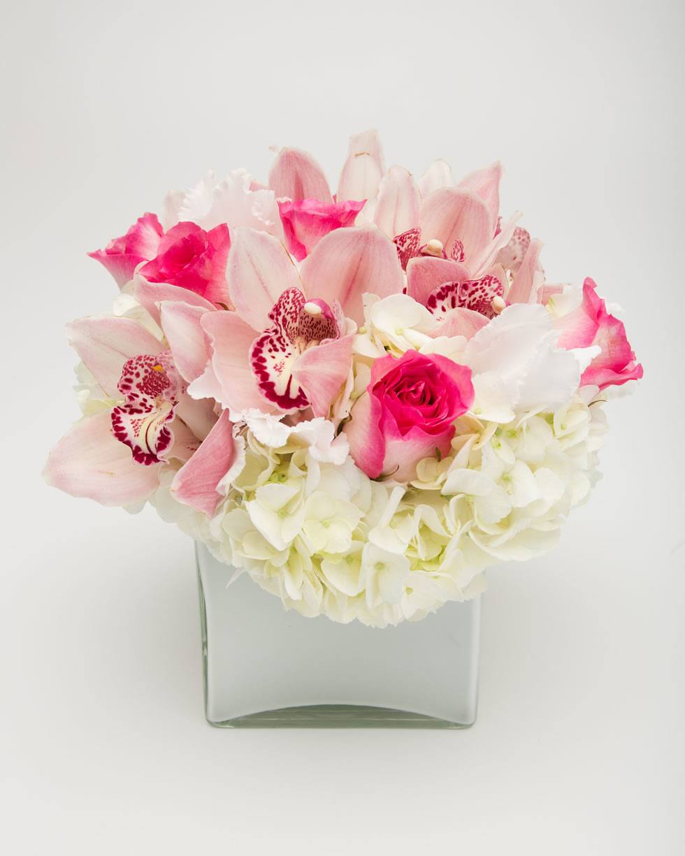 Coquette Flower Arrangement with White Hydrangea, Pink Roses, and Cymbidium Orchids - Jerome Florists 
