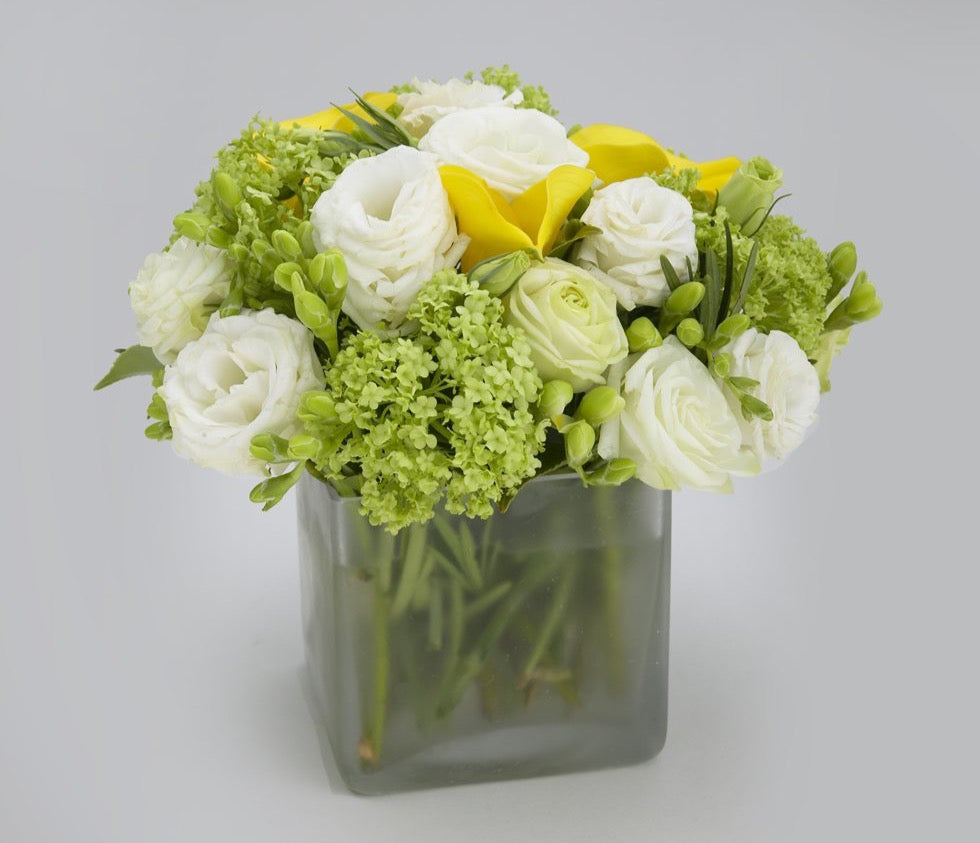 Yellow and green calla lily hydrangea and ranunculus arrangement – Jerome Florists NYC