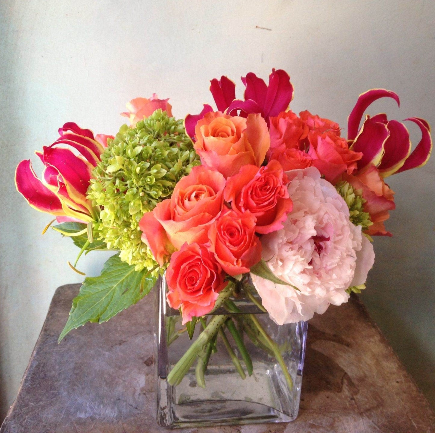 Vibrant pink peony green hydrangea and rose arrangement – Jerome Florists NYC